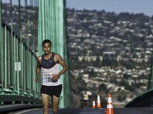 © Reidar Schopp, All Rights Reserved, www.RLSFoto.com. Labor Day morning 9/7/2015 at 8:05 was the start of the Conquer the Bridge Run. Starting at 5th and Harbor Blvd in San Pedro, the run is over the Vincent Thomas Bridge with a U-Turn at Navy Way and then back over the bridge to 5th and Harbor. The run is 5.3 miles and is a fundraiser for the LAPD Cadet program. Francisco Garcia lead the entire race winning by 2 1/2 minutes.